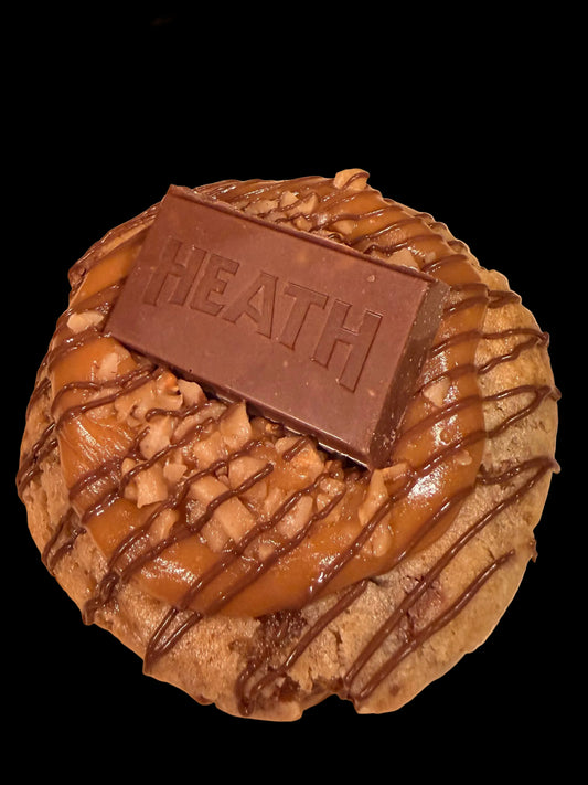 Stuffed with heath candy pieces, topped with caramel, heath candy pieces and chocolate drizzle. 